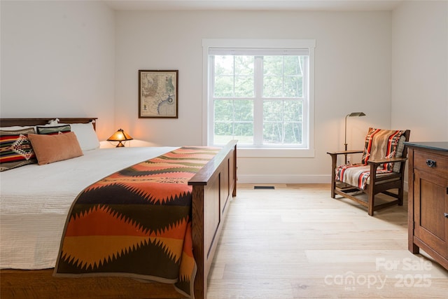 48 Falling Leaves Ln, Hendersonville, NC 28792 - bedroom with light wood-style flooring and baseboards