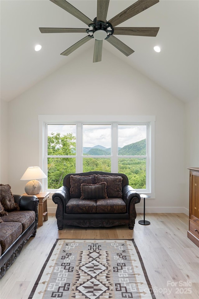 48 Falling Leaves Ln, Hendersonville, NC 28792 - living area with wood finished floors, a ceiling fan, vaulted ceiling, and recessed lighting