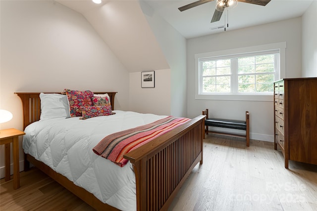 48 Falling Leaves Ln, Hendersonville, NC 28792 - bedroom featuring light wood-style floors, lofted ceiling, and a ceiling fan