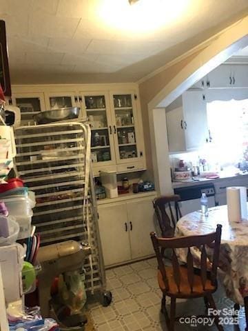 410 Arthur Ave, Gastonia, NC 28052 - kitchen featuring light countertops and glass insert cabinets