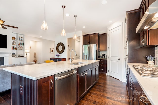 11225 Black Brant Ln, Charlotte, NC 28278 - kitchen with stainless steel appliances, extractor fan, open floor plan, dark wood-type flooring, and a kitchen island with sink