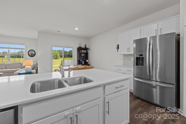 2036 Vanderlyn St, Monroe, NC 28112 - kitchen with stainless steel refrigerator with ice dispenser, dark wood finished floors, light countertops, healthy amount of natural light, and recessed lighting