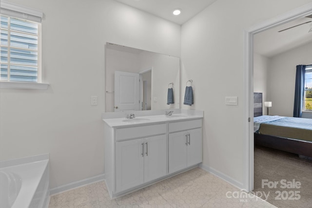 2036 Vanderlyn St, Monroe, NC 28112 - bathroom featuring ensuite bathroom, double vanity, and a bath