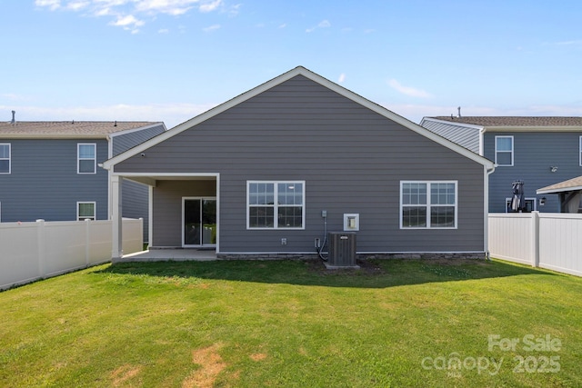 2036 Vanderlyn St, Monroe, NC 28112 - rear view of property with a fenced backyard and a patio area