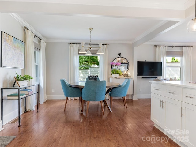 4618 Emory Ln, Charlotte, NC 28211 - dining space with wood finished floors and ornamental molding