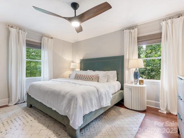 4618 Emory Ln, Charlotte, NC 28211 - bedroom featuring wood finished floors and a ceiling fan