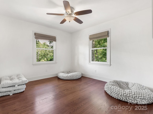 4618 Emory Ln, Charlotte, NC 28211 - sitting room with healthy amount of natural light, wood finished floors, and a ceiling fan