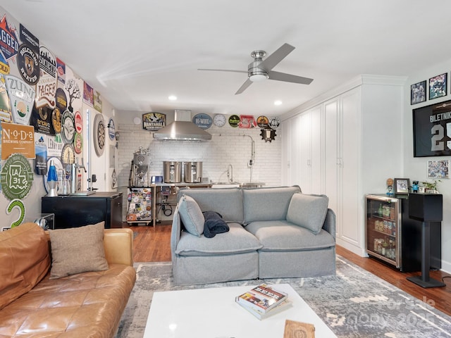 4618 Emory Ln, Charlotte, NC 28211 - living area featuring a ceiling fan, wood finished floors, beverage cooler, and recessed lighting