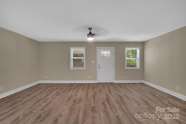 6208 Karenstone Dr, Charlotte, NC 28215 - foyer with wood finished floors and a ceiling fan