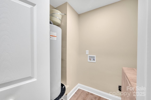 6208 Karenstone Dr, Charlotte, NC 28215 - laundry area with washer hookup and light wood finished floors