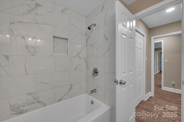 6208 Karenstone Dr, Charlotte, NC 28215 - bathroom with bathtub / shower combination and wood finished floors