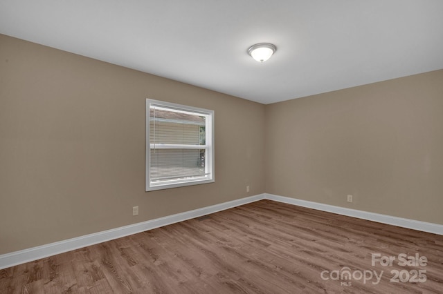 6208 Karenstone Dr, Charlotte, NC 28215 - empty room featuring wood finished floors
