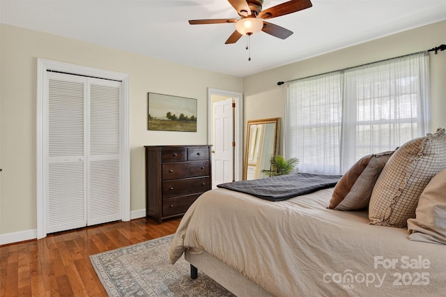 601 Pennell St NE, Lenoir, NC 28645 - bedroom with wood finished floors, ceiling fan, and a closet