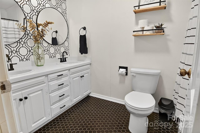 601 Pennell St NE, Lenoir, NC 28645 - bathroom featuring toilet and double vanity