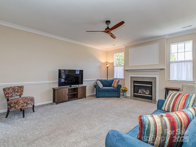 15739 Circlegreen Dr, Charlotte, NC 28273 - carpeted living area with ornamental molding, ceiling fan, and a fireplace