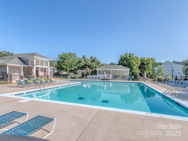15739 Circlegreen Dr, Charlotte, NC 28273 - community pool featuring a patio
