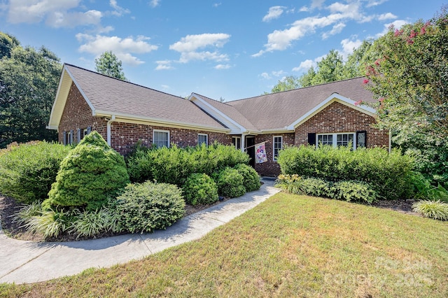 610 Mountain Pl, Albemarle, NC 28001 - ranch-style home featuring brick siding, a front lawn, and roof with shingles