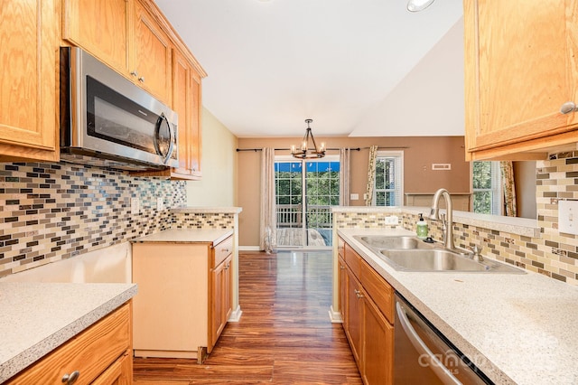 610 Mountain Pl, Albemarle, NC 28001 - kitchen with appliances with stainless steel finishes, decorative backsplash, light countertops, dark wood finished floors, and lofted ceiling