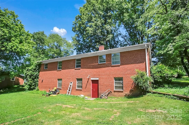 113 N Academy St, Mooresboro, NC 28114 - view of front of property featuring a chimney, a front lawn, and brick siding