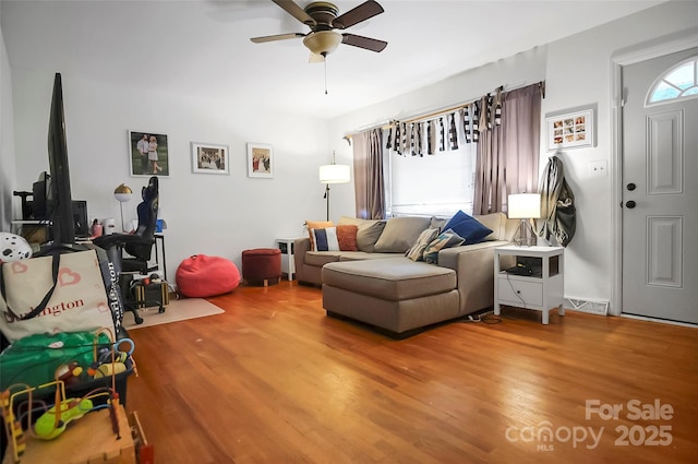 113 N Academy St, Mooresboro, NC 28114 - living room with light wood-type flooring and ceiling fan