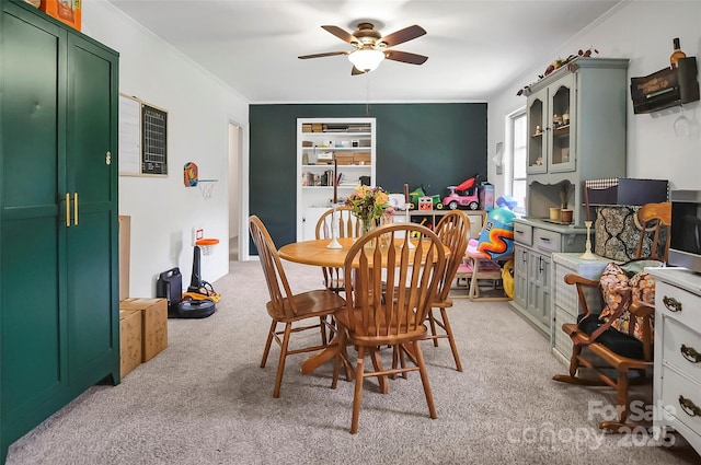 113 N Academy St, Mooresboro, NC 28114 - dining room with light carpet, ceiling fan, and ornamental molding