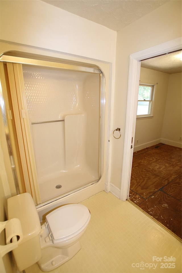 1541 Kings Rd, Shelby, NC 28150 - full bathroom featuring a stall shower and a textured ceiling