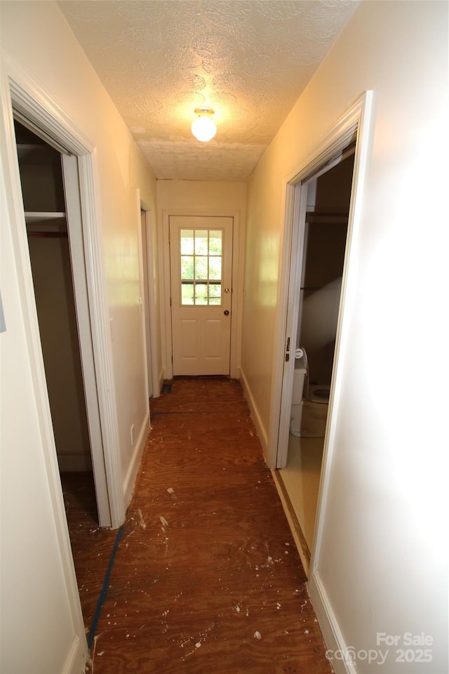 1541 Kings Rd, Shelby, NC 28150 - hall with a textured ceiling and wood finished floors
