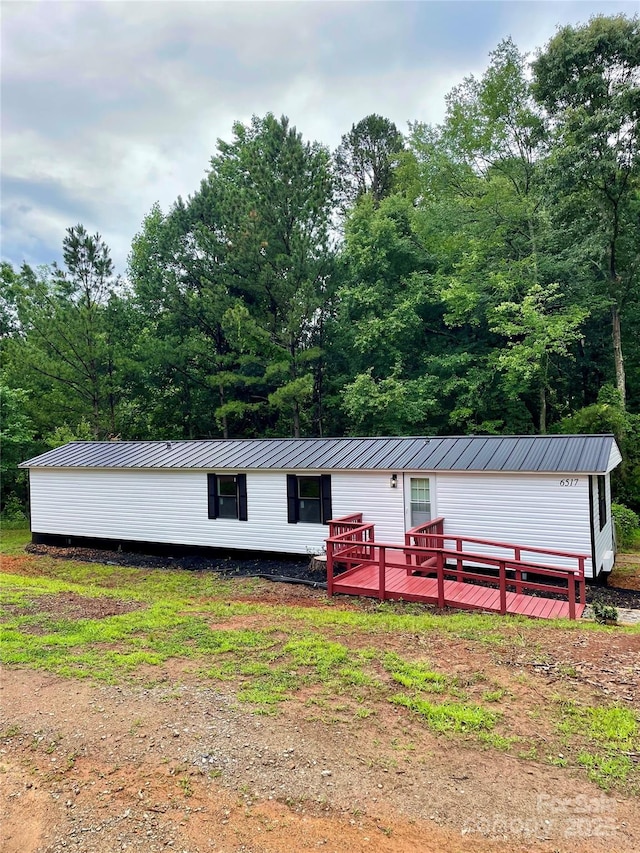6517 Helens Way, Denver, NC 28037 - view of front of property featuring a wooden deck and a metal roof