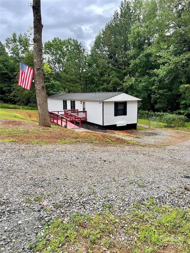 6517 Helens Way, Denver, NC 28037 - view of front of home featuring a metal roof and a deck