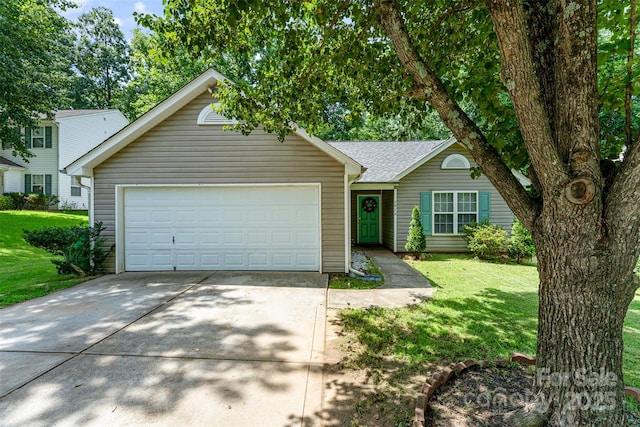 5914 Redding Rd, Charlotte, NC 28216 - view of front of home featuring an attached garage, driveway, a front lawn, and a shingled roof