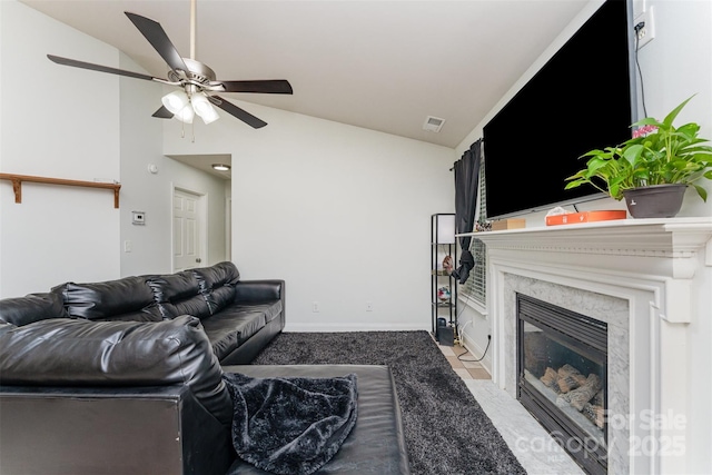 5914 Redding Rd, Charlotte, NC 28216 - living room with lofted ceiling, a ceiling fan, and a premium fireplace