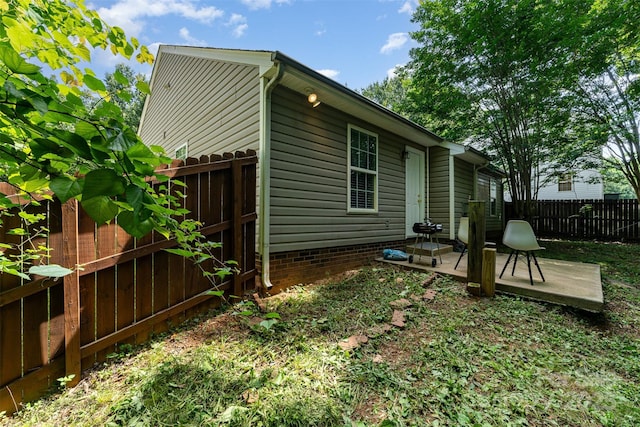 5914 Redding Rd, Charlotte, NC 28216 - back of house with a fenced backyard and a deck