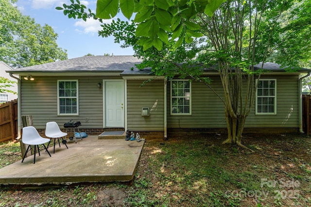 5914 Redding Rd, Charlotte, NC 28216 - rear view of house featuring a patio area and roof with shingles