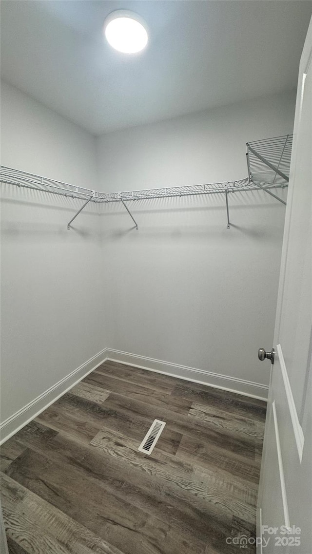 440 Brown Acres Rd, Salisbury, NC 28146 - walk in closet featuring dark wood-type flooring