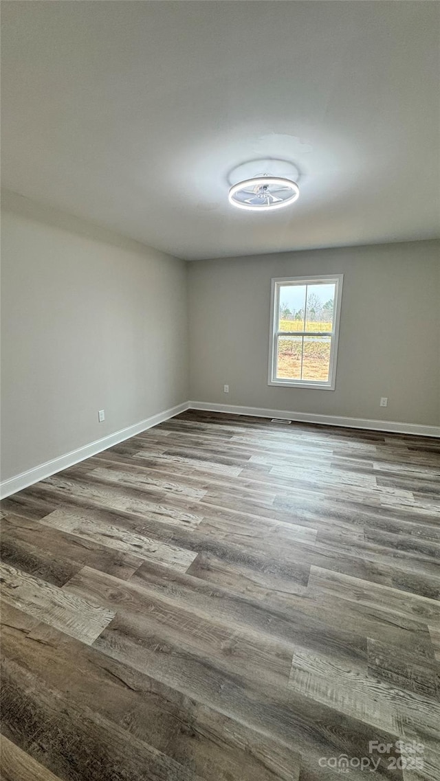440 Brown Acres Rd, Salisbury, NC 28146 - unfurnished room featuring wood finished floors and baseboards
