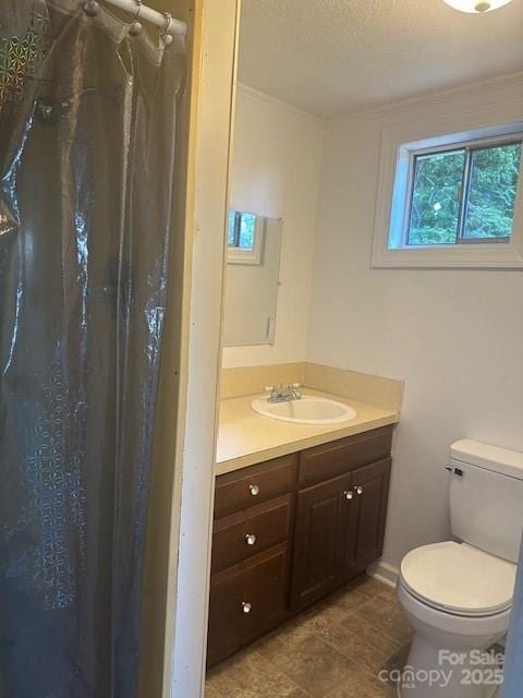 1011 Warren Pl NW, Lenoir, NC 28645 - full bathroom featuring vanity, curtained shower, tile patterned flooring, and a textured ceiling