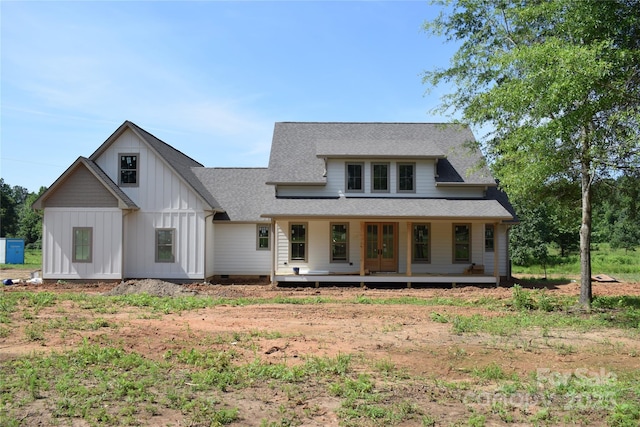960 Johnson Rd, Columbus, NC 28722 - view of front of property with board and batten siding, a shingled roof, a porch, and french doors