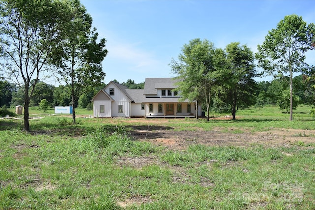 960 Johnson Rd, Columbus, NC 28722 - view of front facade featuring board and batten siding and a porch