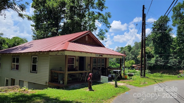 160 Cleveland Rd, Tryon, NC 28782 - view of front of house featuring a metal roof