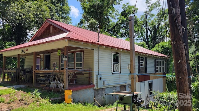160 Cleveland Rd, Tryon, NC 28782 - back of house with covered porch and a metal roof