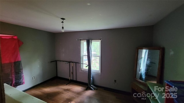 160 Cleveland Rd, Tryon, NC 28782 - spare room with wood finished floors and baseboards