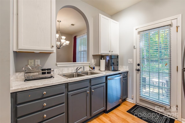 14755 Lions Paw St, Charlotte, NC 28273 - kitchen featuring dishwasher, light countertops, gray cabinetry, and plenty of natural light