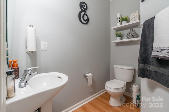 14755 Lions Paw St, Charlotte, NC 28273 - bathroom with wood finished floors and toilet