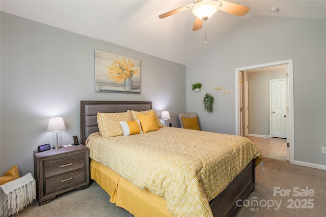 14755 Lions Paw St, Charlotte, NC 28273 - bedroom with light colored carpet, vaulted ceiling, and a ceiling fan