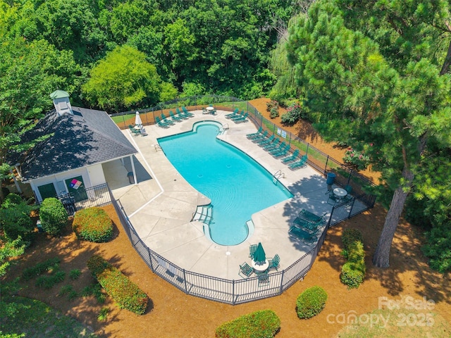 14755 Lions Paw St, Charlotte, NC 28273 - community pool with a patio area