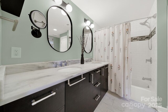 2314 Wolfe St, Charlotte, NC 28205 - bathroom featuring shower / tub combo and double vanity