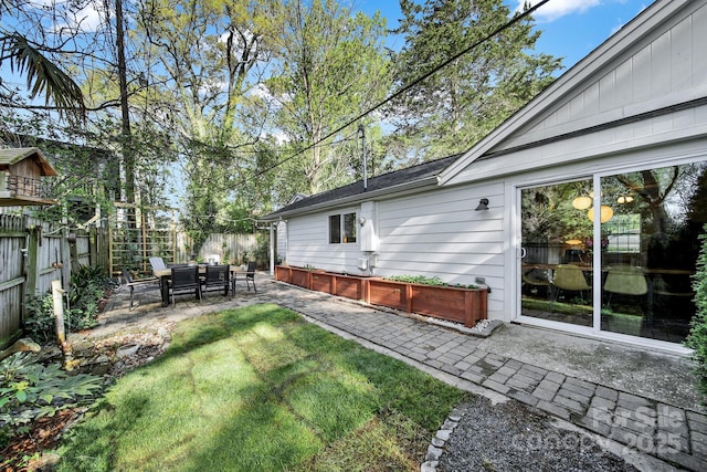 2314 Wolfe St, Charlotte, NC 28205 - fenced backyard featuring a patio