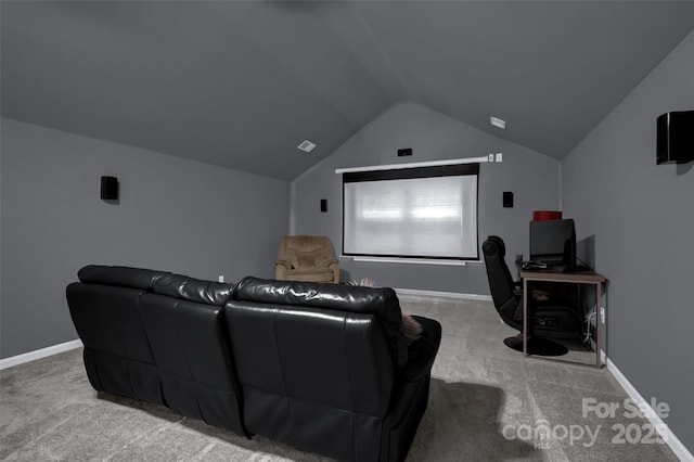 10104 Treetop Ln, Cornelius, NC 28031 - carpeted home theater room featuring vaulted ceiling and baseboards