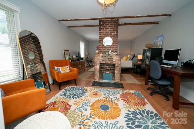 1712 Umstead St, Charlotte, NC 28205 - home office with wood finished floors and a fireplace