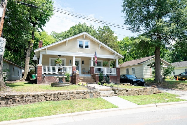 1712 Umstead St, Charlotte, NC 28205 - view of front of house featuring covered porch and a chimney
